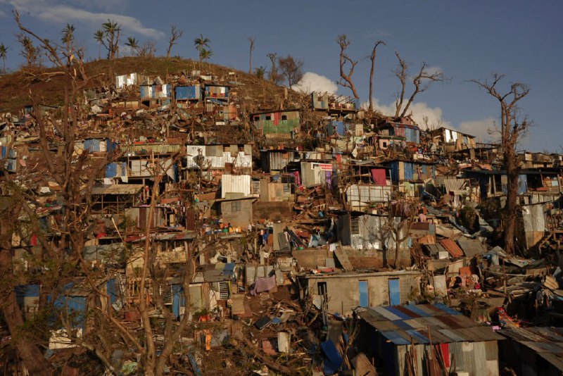 France’s Macron extends visit to cyclone-hit Mayotte after locals vent angerBy Agence France-PresseFrench President Emmanuel Macron extended his visit to cyclone-devastated Mayotte on Friday after angry residents vented exasperation and despair over the scale of the disaster.Locals jeered and shouted their grievances Thursday during Macron’s visit to the Indian Ocean archipelago, five days after Cyclone Chido left a trail of destruction in its wake.“I decided to sleep here because I considered that given what the population is going through,” leaving the same day could have “installed the idea that we come, we look, we leave,” he told reporters late Thursday.“It is a mark of respect, of consideration.”Emergency teams are still working at full pace, searching for survivors and supplying desperately-needed aid.Damage in the Kaweni slum on the outskirts of Mamoudzou, Mayotte. Photo: AFPvia SCMP Full Text Feed